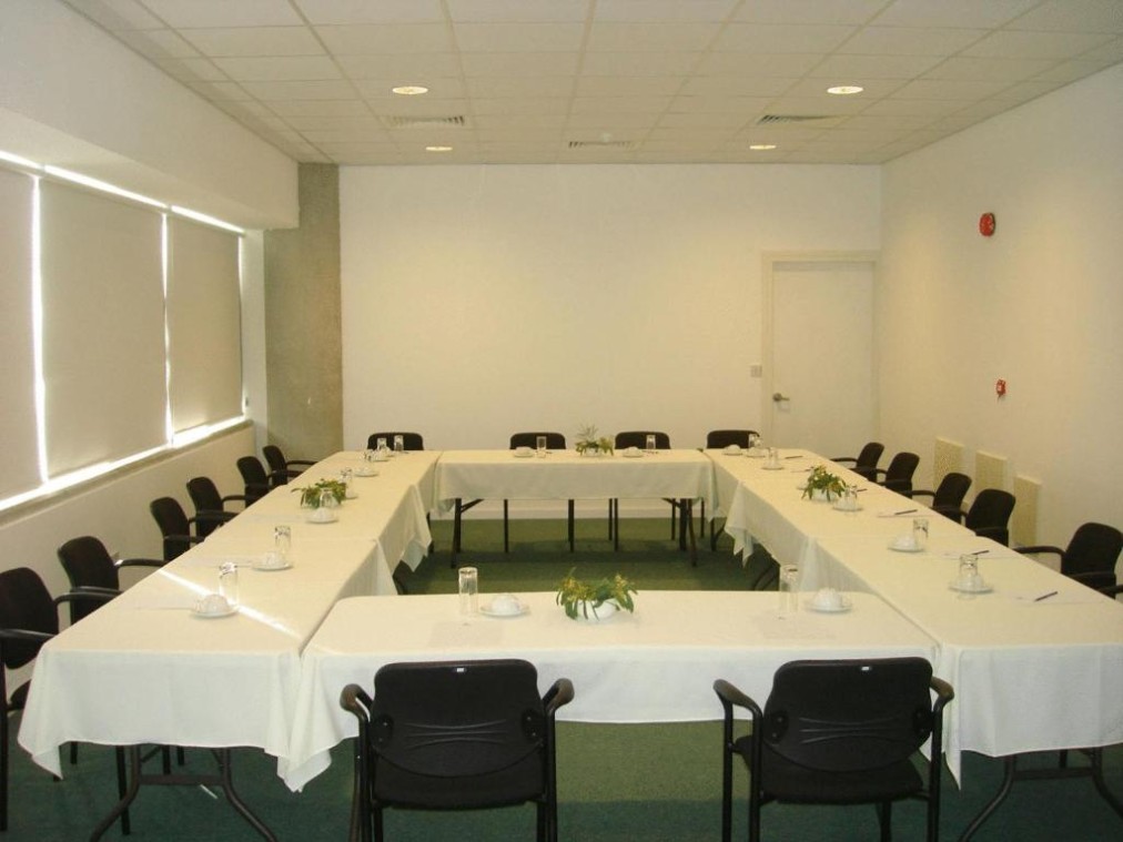 Meeting room with table setup for coaching session or staff coordination