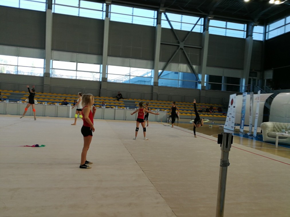 Gymnasts training indoors