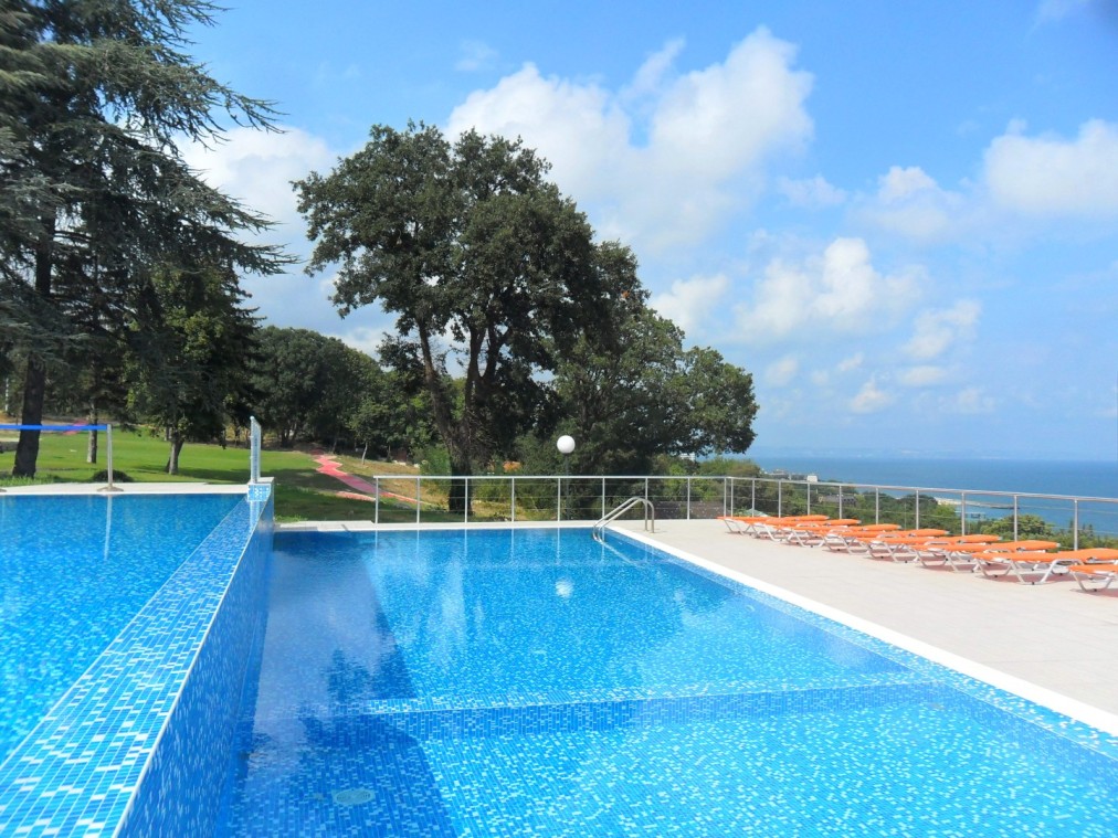 Outdoor pool with sea view