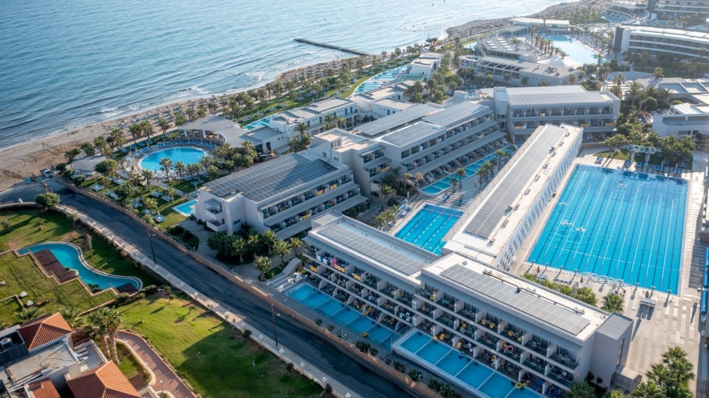 Beachfront hotel with lane pools, aerial view