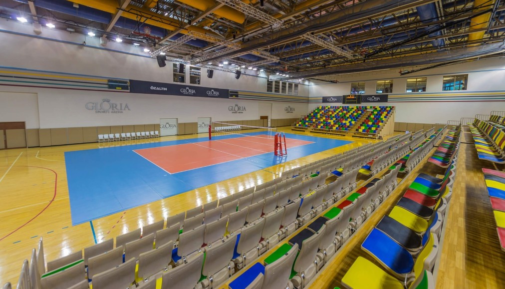 Indoor arena with volleyball setup