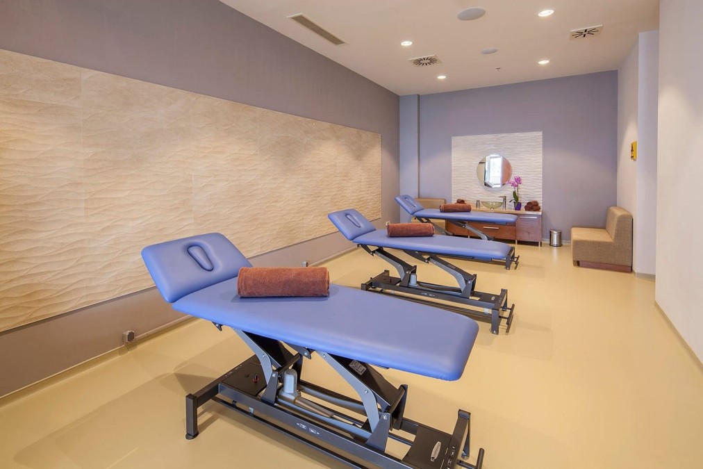 Indoor massage and treatment room with therapy tables