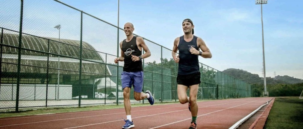 Runners on the outdoor athletics track