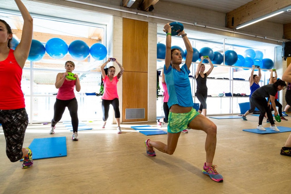 Functional training class with medicine balls