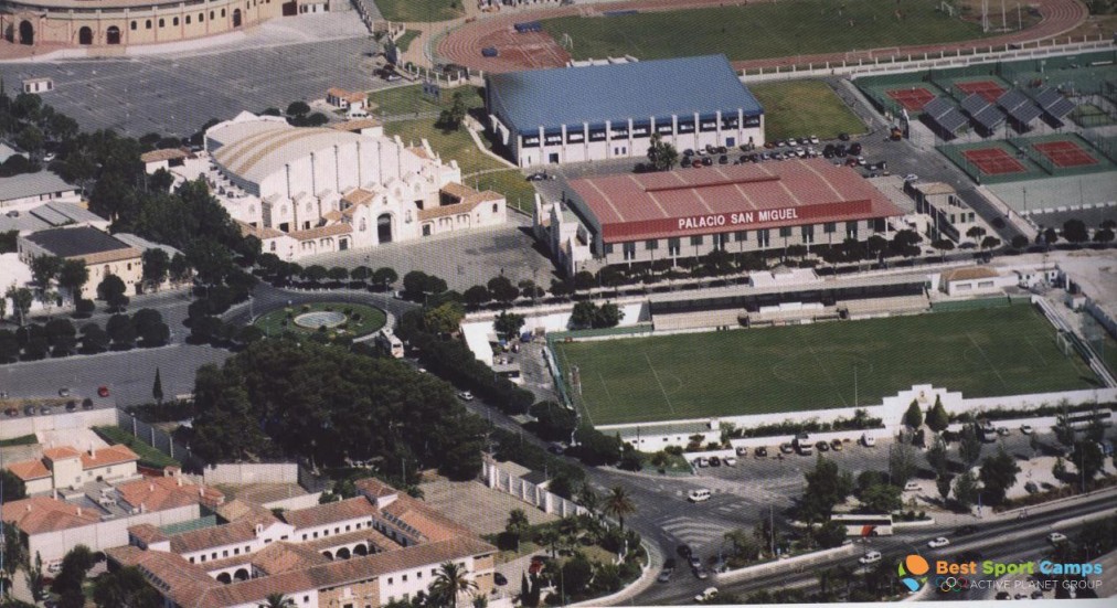 Aerial view of the Sports Complex: pitches, indoor hall, running track, tennis courts