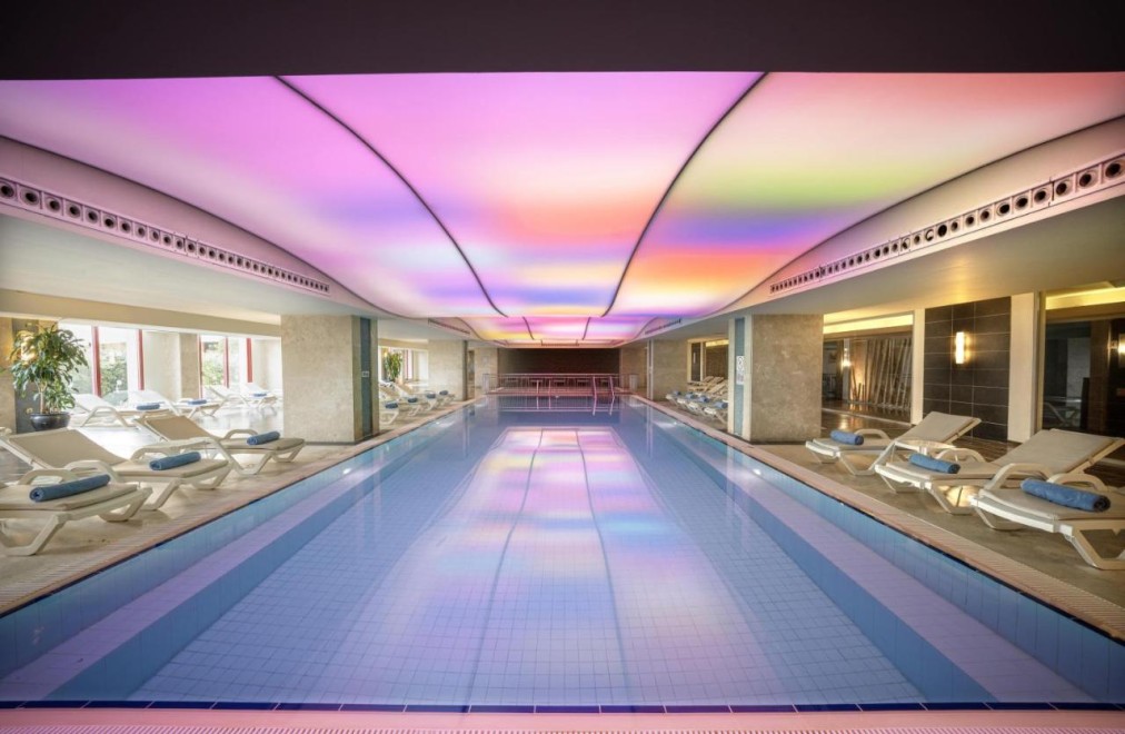 Indoor pool with lounge chairs