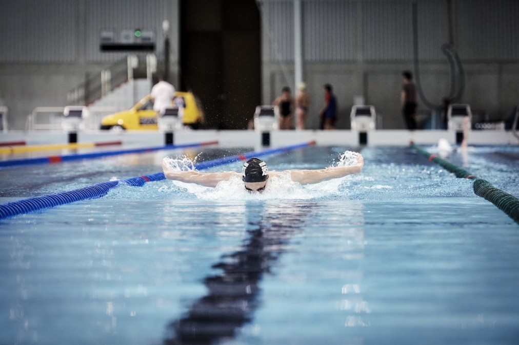 Swimmer training in the indoor pool