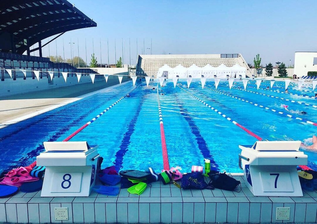 Outdoor 50m pool — starting blocks and lane ropes
