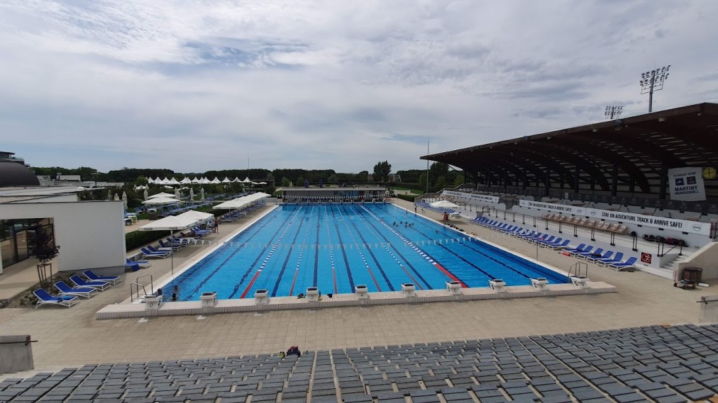 Outdoor 50m pool with covered grandstand