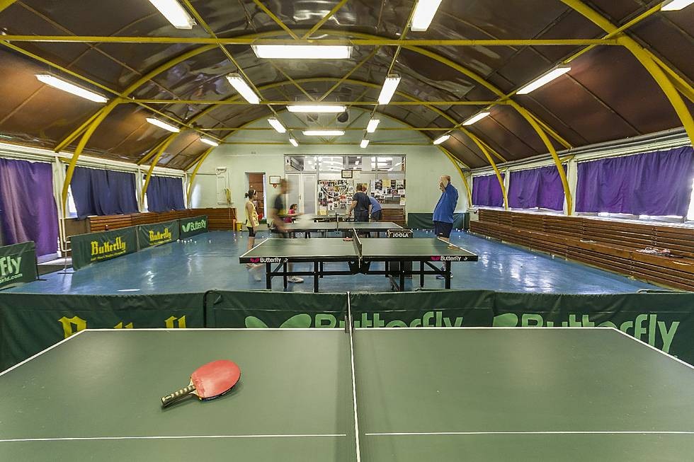 Table tennis hall with multiple tables