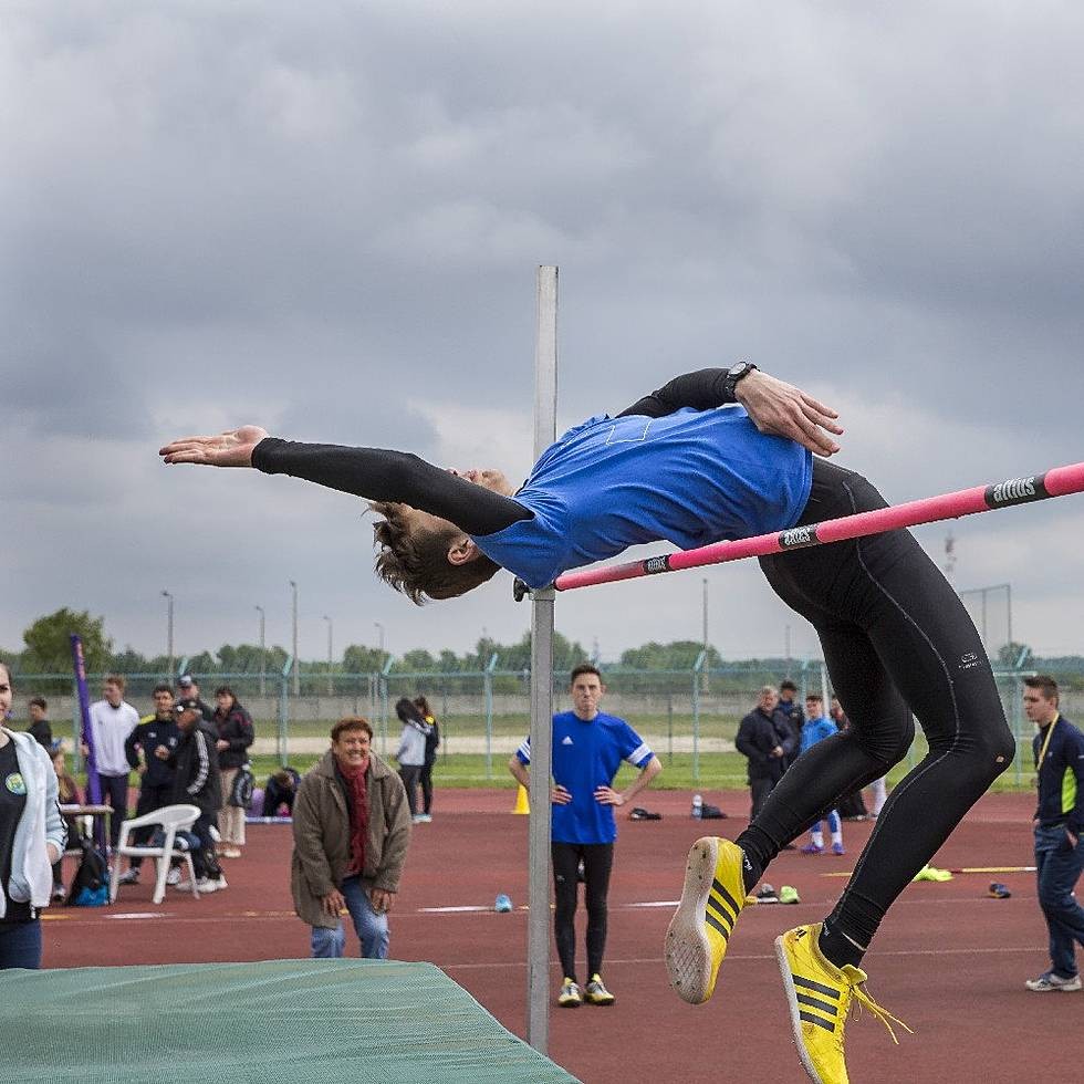 Athlete clearing the bar in a high jump event