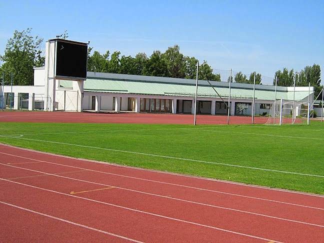 Athletics stadium with covered grandstand