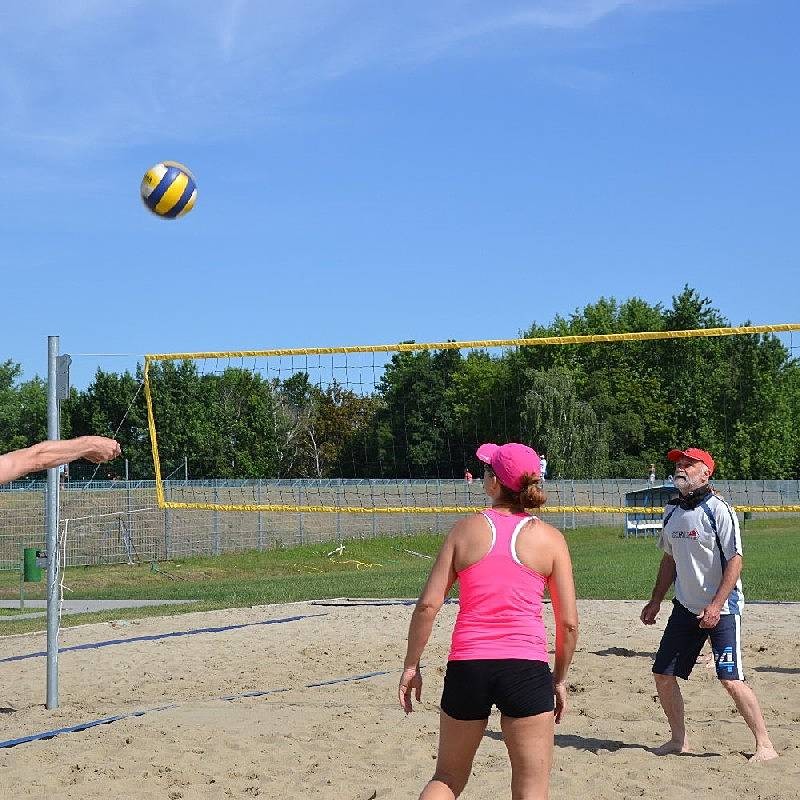 Beach volleyball match in play