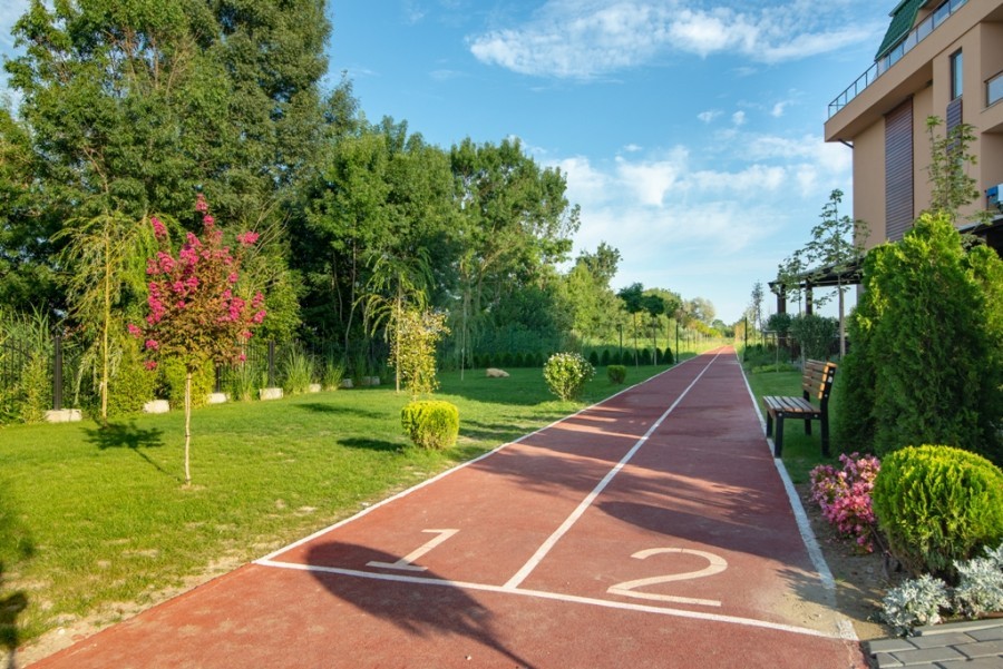 Running track through landscaped grounds