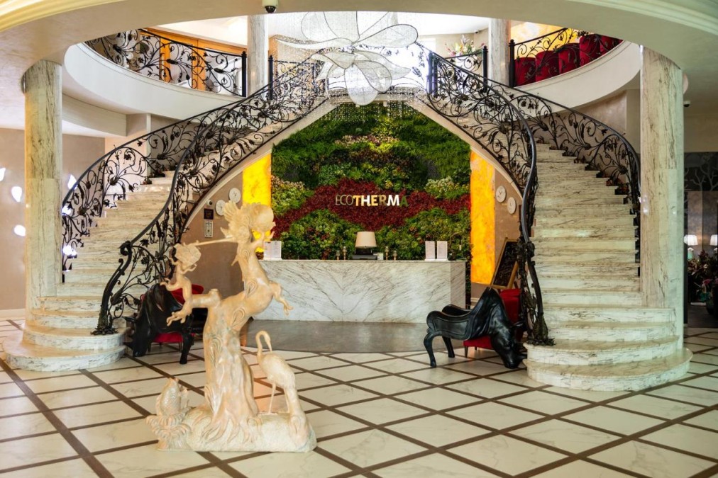 Hotel lobby with dual staircase