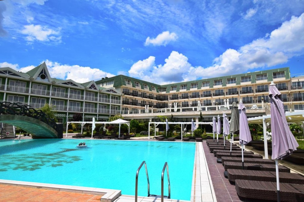 Outdoor guest pool with sun loungers
