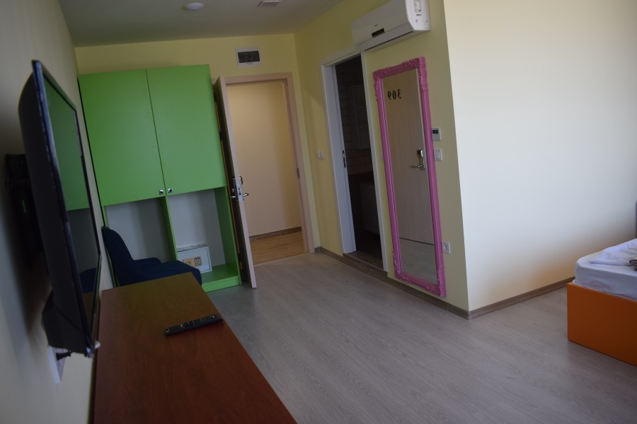 Room entryway with storage cabinet
