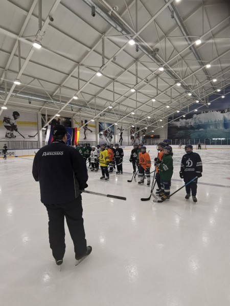 Ice rink with youth hockey training session