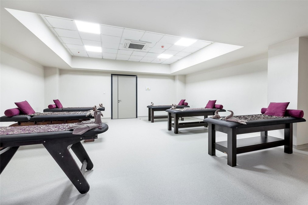 Massage therapy room with treatment beds