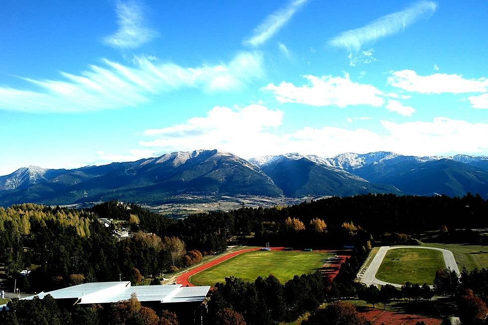 Training campus overview with Pyrenean peaks