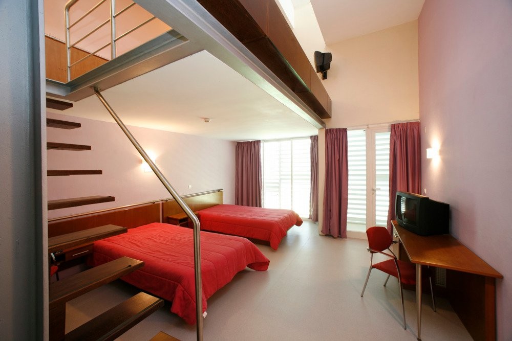 Duplex room with loft level and twin beds