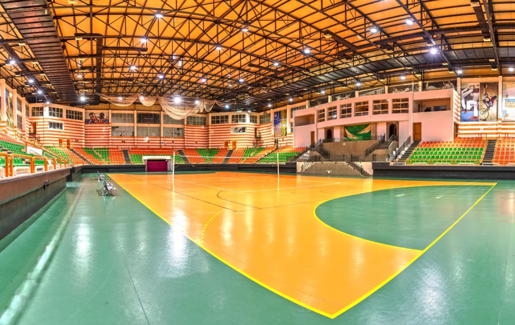 Full court view from the opposite end showing markings and seating sections