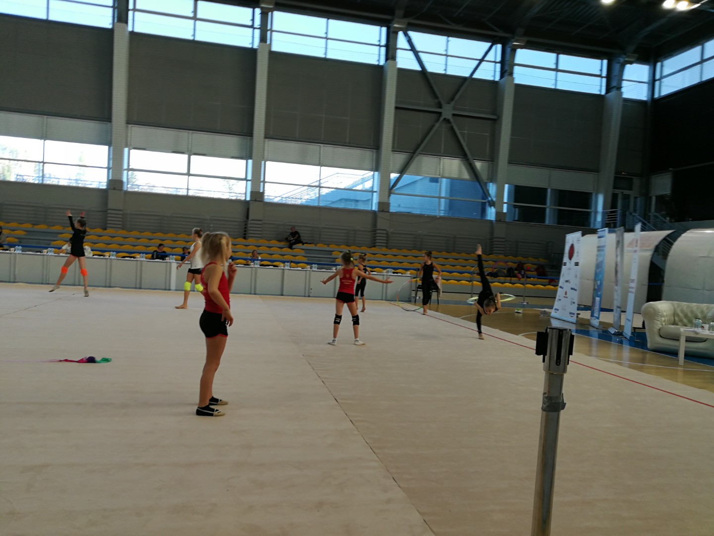 Gymnasts training indoors