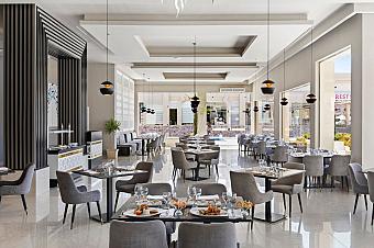 Elegant restaurant dining area with modern decor and neatly set tables